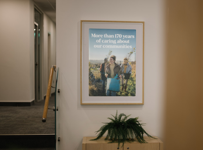 Sign in branch that says 'Over 170 years of caring about our communities'.