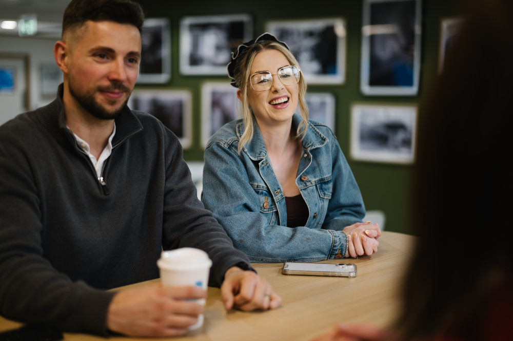 Colleagues chatting together in Skipton Head Office.