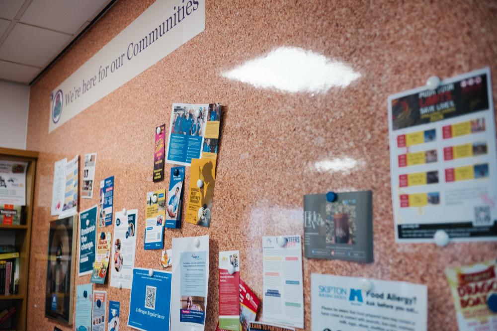Community board signage at Skipton Head Office.
