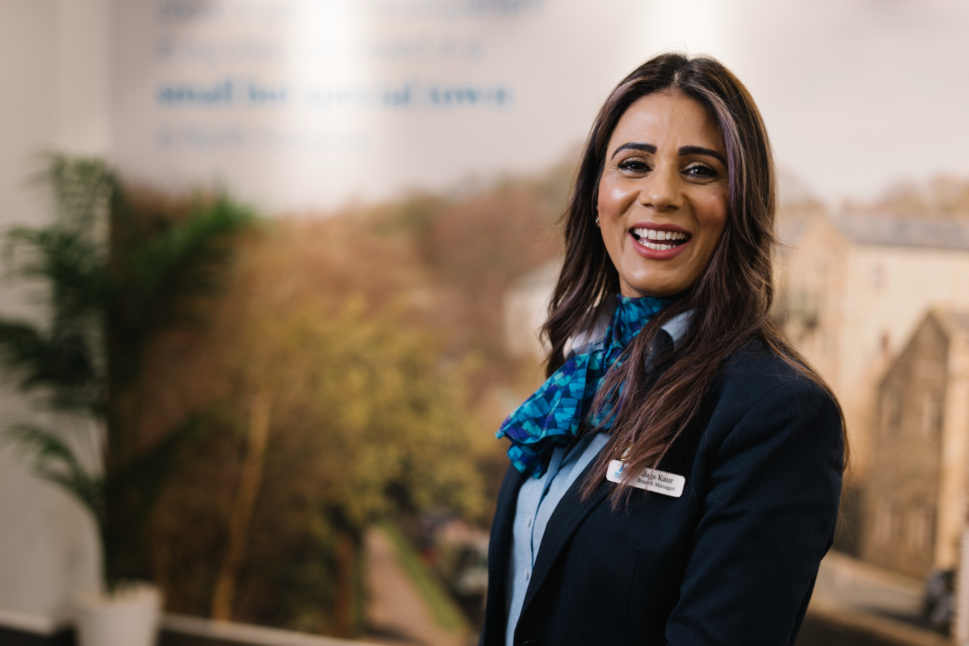 Branch Manager smiling in branch environment