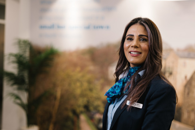 Branch Manager standing in Skipton branch.